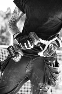 Handyman repairing home fixtures during maintenance service